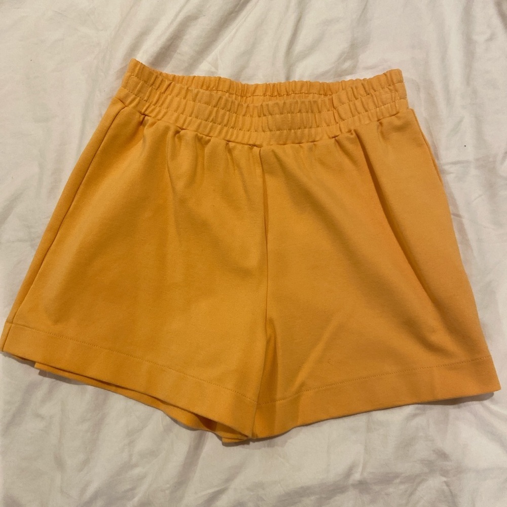 yellow/orange sweat shorts